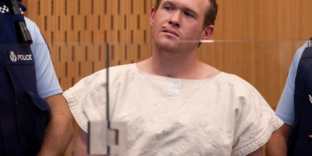 In this Saturday, March 16, 2019 photo, Brenton Tarrant, the man charged in the Christchurch mosque shootings, appears in the Christchurch District Court, in Christchurch, New Zealand.