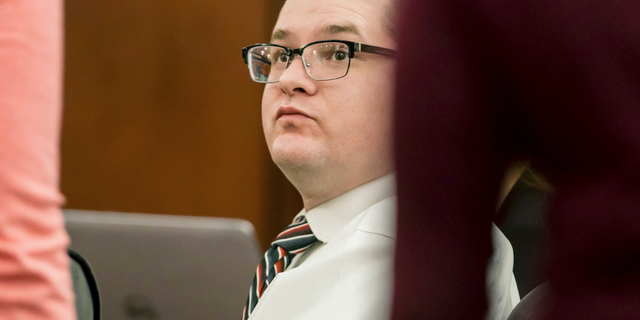 In this Monday, June 3, 2019 photo, Timothy Jones Jr. sits during closing statements in his murder trial at the Lexington County Courthouse, in South Carolina.