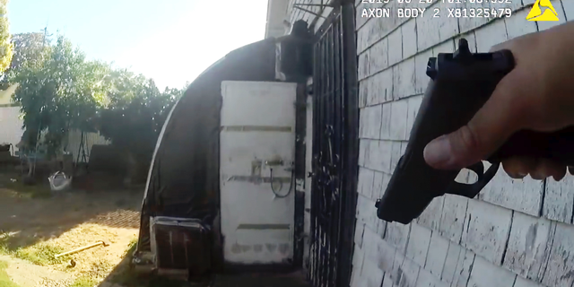 This still image taken from bodycam video released by the Sacramento Police Dept. shows the gunfight in which Sacramento Police Officer Tara O'Sullivan was shot (Sacramento Police Dept. via AP)