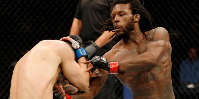 Desmond Green punches Charles Jourdain of Canada during a UFC lightweight bout last month in Rochester, N.Y. (Photo by Michael Owens/Zuffa LLC/Zuffa LLC via Getty Images)