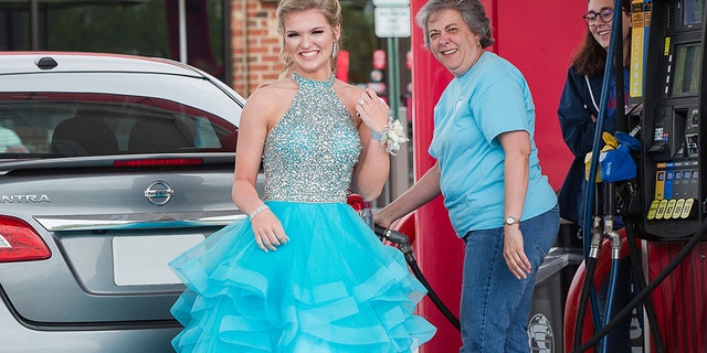 Devin Bennett and Sherry Allgood, pictured, met at the gas station of a Winston-Salem area Sheetz before the teen went off to the big dance.
