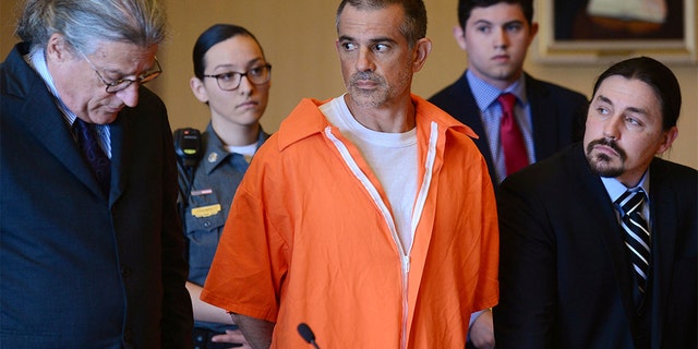 Fotis Dulos and his legal tea during a court hearing Tuesday.