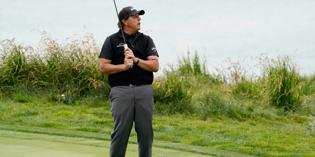 Phil Mickelson reacts after missing a putt on the ninth hole during the first round of the U.S. Open Championship golf tournament Thursday, June 13, 2019, in Pebble Beach, Calif. (AP Photo/David J. Phillip)