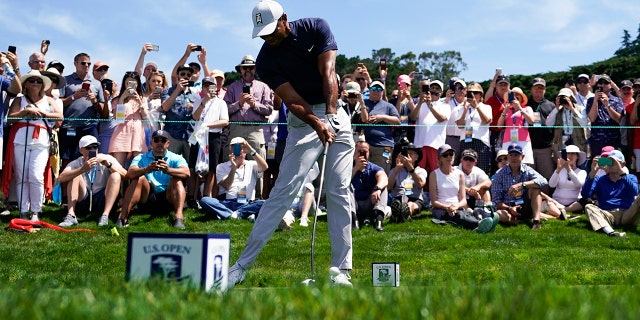 Tiger Woods hits his tee shot on the ninth hole during a practice round for the U.S. Open Championship golf tournament Monday, June 10, 2019, in Pebble Beach, Calif. 