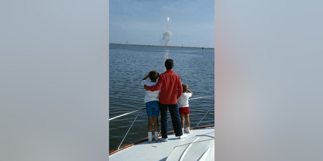 File photo - From the deck of a boat, Janet Armstrong (nee Shearon), and her sons Mark (left) and Ricky, watch the launch of NASA's Apollo 11 mission to the moon, commanded by her husband, astronaut Neal Armstrong, Cape Canaveral (then known as Cape Kennedy), Florida, July 16, 1969.