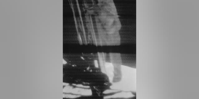 File photo - Commander Neil Armstrong climbs down the ladder of the Lunar Module (LM) the 'Eagle' to become the first man to set foot on the Moon, during NASA's Apollo 11 lunar landing mission, July 1969. Video footage taken during the mission.