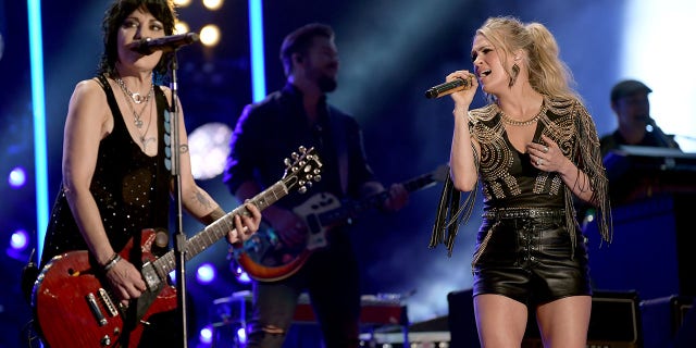 Joan Jett, left, and Carrie Underwood perform during day 2 of the 2019 CMA Music Festival on June 7, 2019, in Nashville, Tenn. (Getty Images)