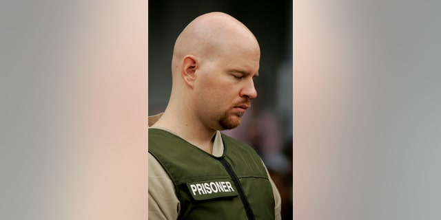 Mark Hacking reacts as the judge gives judgment during his sentencing on June 6, 2005, in Salt Lake City, Utah. (Photo by Doug Pizac- POOL/Getty Images)