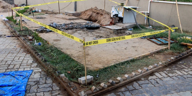 Seven people, including four workers and three hotel staff, died of suffocation while cleaning the septic tank of a hotel in India on Friday.