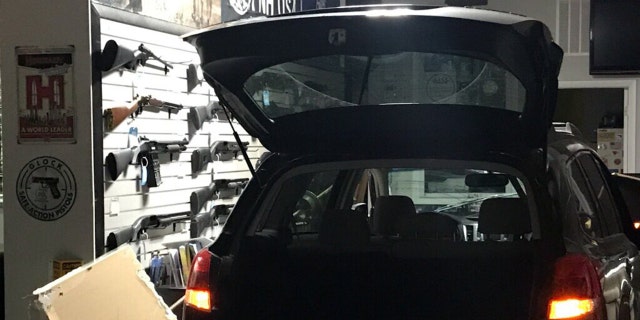 Police said the suspects used two cars during Thursday's burglary: one to break into the storefront and a second to escape.
