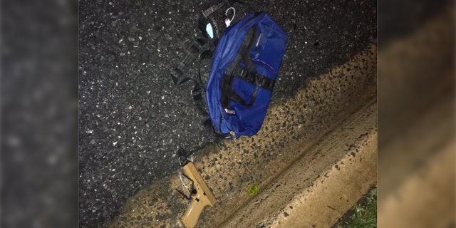 A bag of stolen guns abandoned by the suspects.