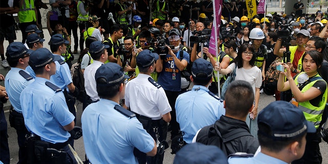 Protesters negotiating with police outside the Legislative Council building in Hong Kong.
