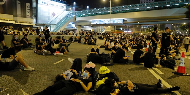 Protesters resting on the streets overnight near the Legislative Council.