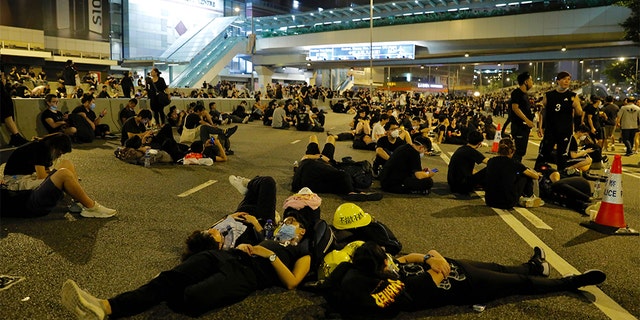 Protesters resting on the streets overnight near the Legislative Council.