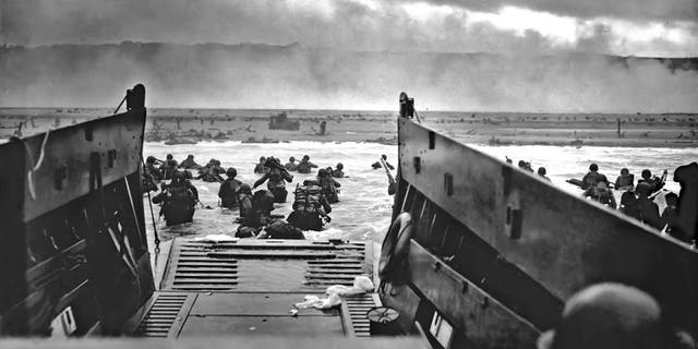 Coast Guard Chief Photographer’s Mate Robert F. Sargent captured this famous D-Day image of the scene on Omaha Beach at about 7:40 a.m. on June 6, 1944.