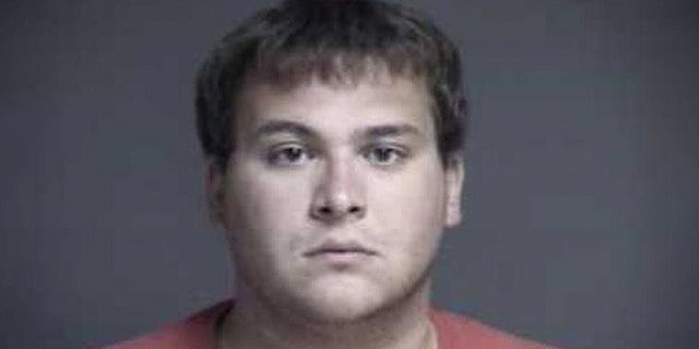 John Austin Hopkins, 25, was indicted after allegedly touching dozens of first-grade female students inappropriately during gym class, officials said.