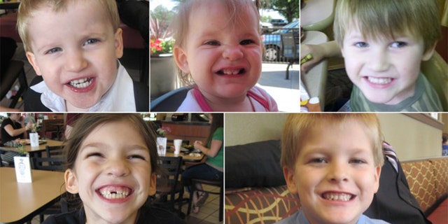 Timothy Jones Jr. is accused of killing his five children, ages 1 to 8, and throwing their bodies on a dirt road in Alabama. The Lexington County Sheriff's Department has released these photos of the victims. Above, from left to right: Gabriel Jones, Abigail Elizabeth Jones and Nahtahn Jones. Bottom left to right: Merah Gracie Jones and Elias Jones.