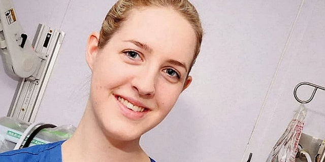 A nurse, identified by local news outlets as Lucy Letby, was rearrested in England on Monday for allegedly killing eight babies and trying to kill nine more, officials said.