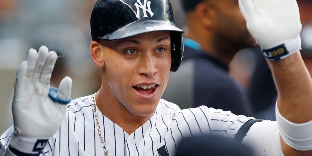 New York Yankees' Aaron Judge celebrates after hitting a solo home run during the first inning of the team's baseball game against the Toronto Blue Jays, Tuesday, June 25, 2019, in New York. It was Judge's first home run since returning from a stint on the injured list. (AP Photo/Kathy Willens)