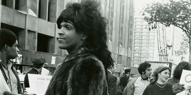 Transgender activist Marsha P. Johnson handing out flyers in support of Gay Students at NYU in 1970. (REUTERS/Diana Davies)