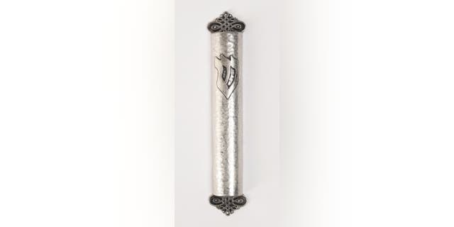 The mezuzah that was flown aboard the Space Shuttle Columbia. (RR Auction)