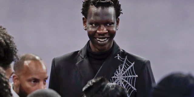 Oregon's Bol Bol smiles before the NBA Draft Thursday, June 20, 2019, in New York. (AP Photo/Julio Cortez)