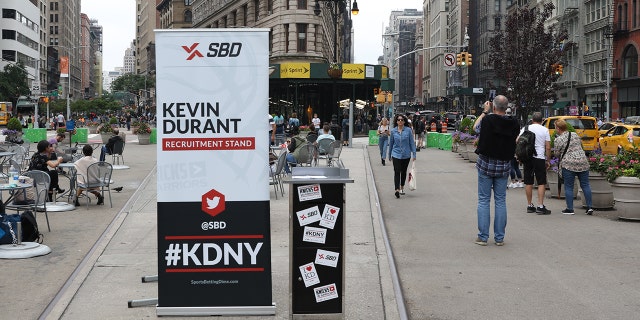 Kevin Durant recruitment stands pop up around New York City.