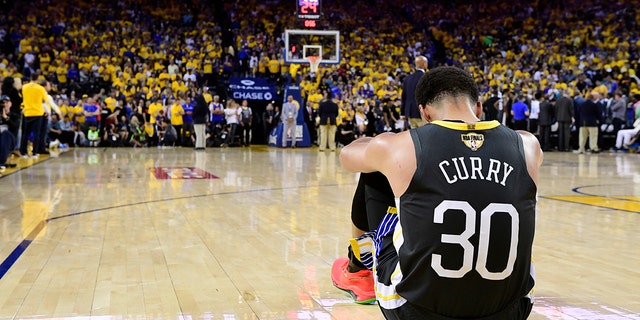 Golden State Warriors guard Stephen Curry reacts after teammate Klay Thompson was injured during the second half against the Toronto Raptors in Game 6 of basketball’s NBA Finals, Thursday, June 13, 2019, in Oakland, Calif. (Frank Gunn/The Canadian Press via AP)