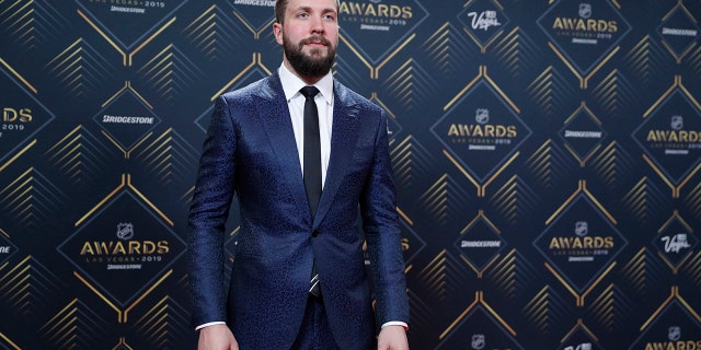 Tampa Bay Lightning's Nikita Kucherov poses on the red carpet before the NHL Awards, Wednesday, June 19, 2019, in Las Vegas. (AP Photo/John Locher)
