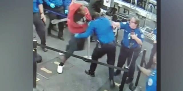 Footage taken at the Phoenix Sky Harbor International Airport shows the man bursting through the checkpoint.