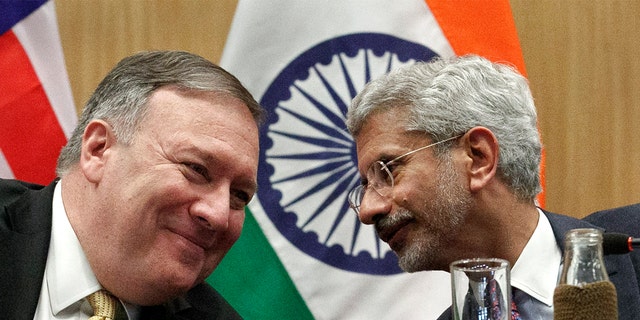 Secretary of State Mike Pompeo, left, listening to Indian Foreign Minister Subrahmanyam Jaishankar during a news conference at the Foreign Ministry in New Delhi, India, on Wednesday. (AP Photo/Jacquelyn Martin, Pool)