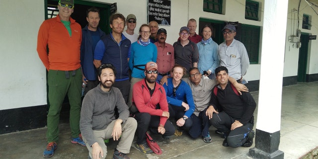 Climbers pose for a picture before leaving for their expedition in Munsiyari town in the northern Himalayan state of Uttarakhand, India May 13, 2019.