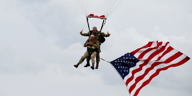 U.S. World War II paratrooper veteran Tom Rice, 97 years-old who served with the 101st Airbone, jumps during a commemorative parachute jump over Carentan on the Normandy coast ahead of the 75th D-Day anniversary, France, June 5, 2019.