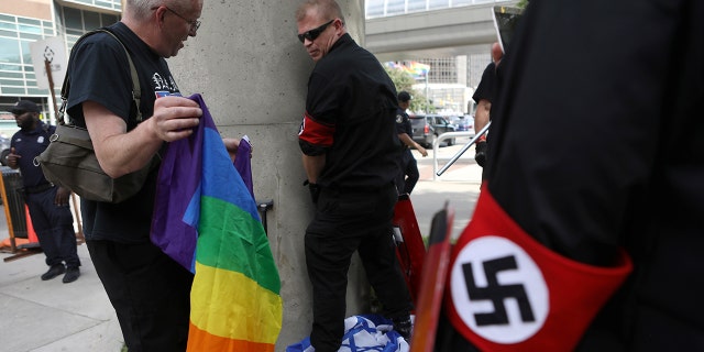 A group of white nationalists marched on an LGBTQ event in Detroit on Saturday, demonstrating Nazi salutes and carrying weapons<br data-cke-eol="1">