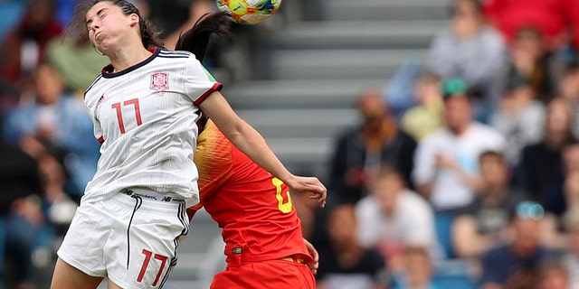 Spain's Lucia Garcia goes up for a header during the Women's World Cup Group B soccer match between China and Spain at the Stade Oceane in Le Havre, France, Monday, June 17, 2019. (AP Photo/Francisco Seco)