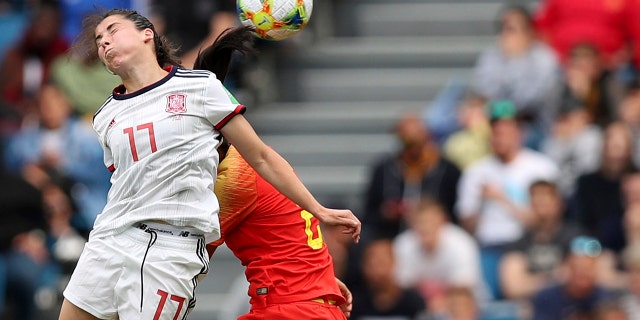 Spain's Lucia Garcia goes up for a header during the Women's World Cup Group B soccer match between China and Spain at the Stade Oceane in Le Havre, France, Monday, June 17, 2019. (AP Photo/Francisco Seco)
