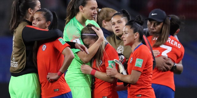 Chile players react at the end of the Women's World Cup Group F soccer match between Thailand and Chile at the Roazhon Park in Rennes, France, Thursday, June 20, 2019. Chile won 2-0, one goal short of the win by three goals difference needed to qualify for the next round. (AP Photo/David Vincent)