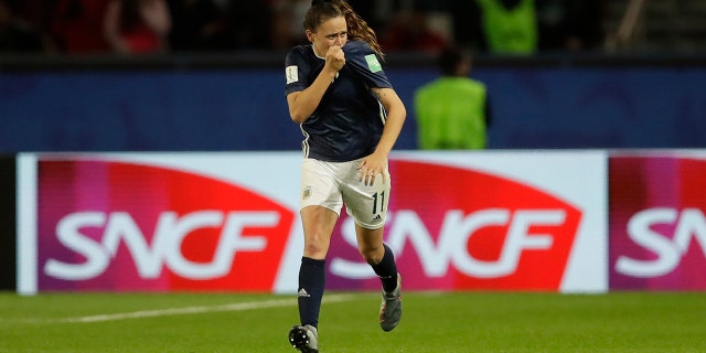 Argentina's Florencia Bonsegundo celebrates after scoring an equaliser goal during the Women's World Cup Group D soccer match between Scotland and Argentina at Parc des Princes in Paris, France, Wednesday, June 19, 2019. Bonsegundo scored in the extra time and the match ended in a 3-3 draw. (AP Photo/Alessandra Tarantino)