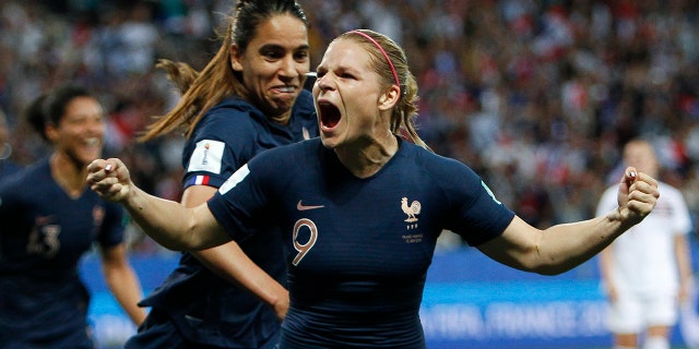 France's Eugenie Le Sommer, celebrates with France's Amel Majri after scoring her side's second goal on a penalty kick during the Women's World Cup Group A soccer match between France and Norway in Nice, France, Wednesday, June 12, 2019. (AP Photo/Claude Paris)