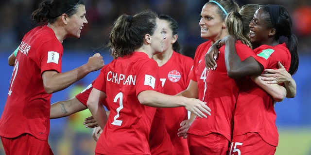 Canada's Nichelle Prince, right, celebrates with her teammates after scoring her side's second goal during the Women's World Cup Group E soccer match between Canada and New Zealand in Grenoble, France, Saturday, June 15, 2019. (AP Photo/Francisco Seco)