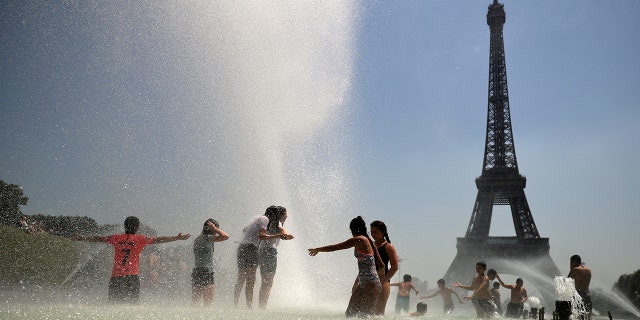 High temperatures are expected to go up to 102 Fahrenheit in the Paris area this week and bake much of the country, from the Pyrenees in the southwest to the German border in the northeast. (AP Photo/Francisco Seco)