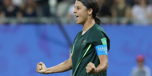 Australia's Sam Kerr celebrates after scoring her side's fourth goal during the Women's World Cup Group C soccer match between Jamaica and Australia at Stade des Alpes stadium in Grenoble, France, Tuesday, June 18, 2019. (AP Photo/Laurent Cipriani)