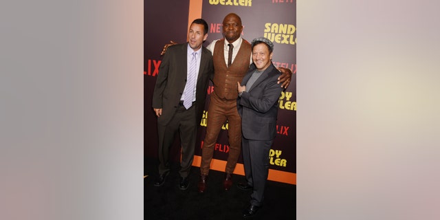 (L-R) Actors Adam Sandler, Terry Crews and Rob Schneider attend the premiere of Netflix's 'Sandy Wexler' at the ArcLight Cinemas Cinerama Dome on April 6, 2017 in Hollywood, Calif. (Photo by Jeffrey Mayer/WireImage)