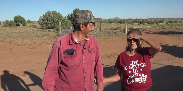The Littlefoots in front of ther home on the vast Navajo Nation land.