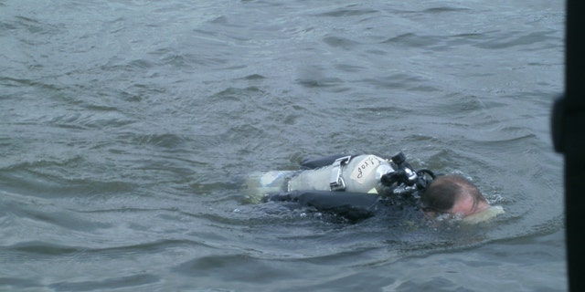 A diver taking part in the search for the shipwreck. (JRS Explorations)