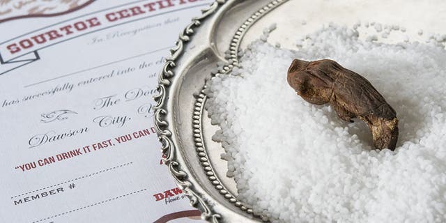 The preserved toes are kept in salt when not serving as garnishes.