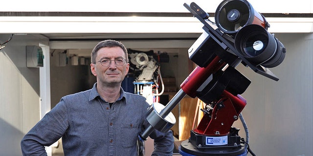 Professor Hakan Kayal next to the lunar telescope. (Credit: Tobias Greiner / Universität Würzburg)