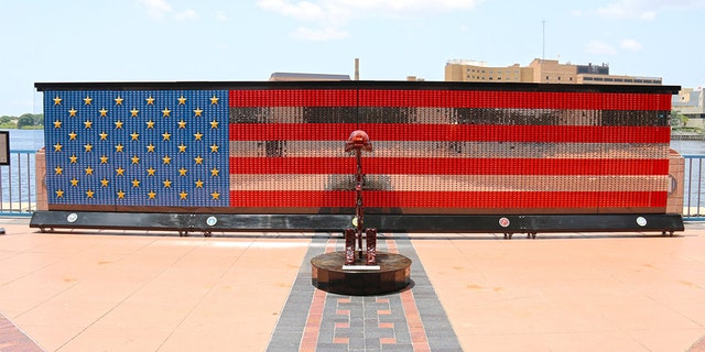 The Fallen Heroes Memorial is now stationed in Florida, honoring American veterans with a 28-foot-wide American flag made of the dog tags of fallen soldiers. (Courtesy of Tampa Convention Center)