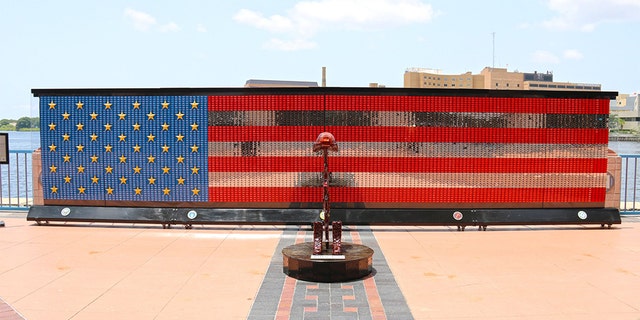 The Fallen Heroes Memorial is now stationed in Florida, honoring American veterans with a 28-foot-wide American flag made of the dog tags of fallen soldiers. (Courtesy of Tampa Convention Center)