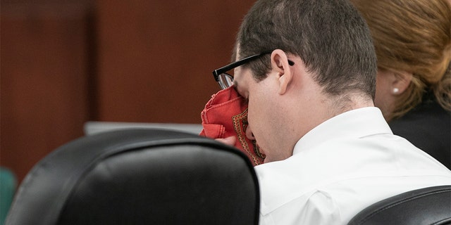 Timothy Jones Jr. wiping his eyes as his ex-wife, Amber Kyzer, testified Tuesday. (Tracy Glantz/The State via AP, Pool)